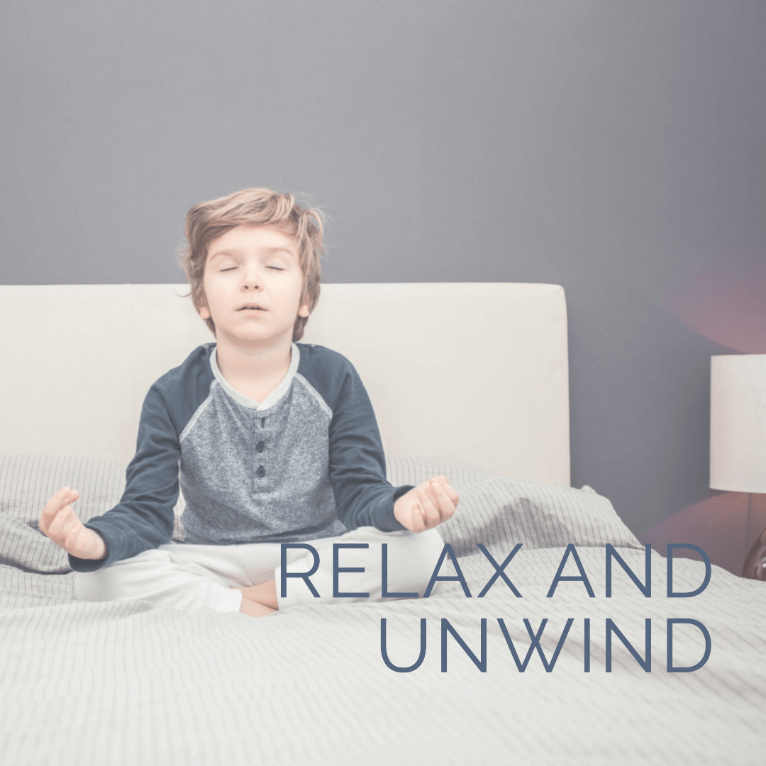 a kid meditating in bed